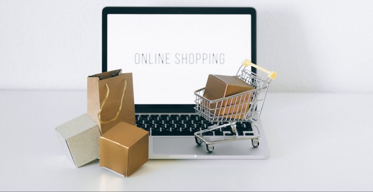 brown cardboard box on stainless steel shopping cart