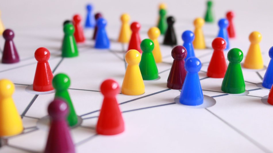 A group of colorful pins forming a network.